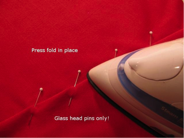 Ironing Folds in Pinned Fabric 