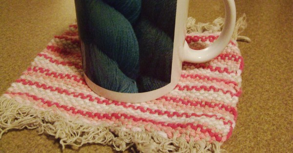 cup on a woven coaster