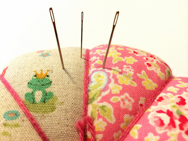 Hand Quilting Needles in a Pincushion