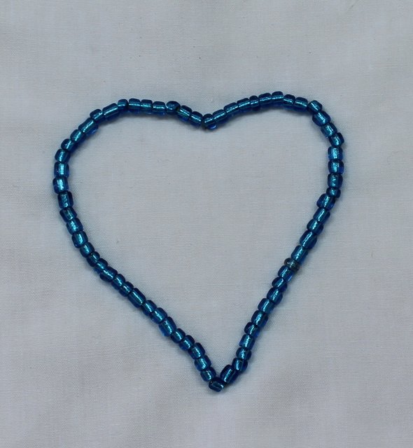 Completed beaded heart embellishment