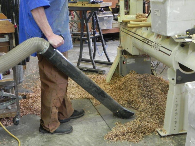 Vacuuming chips to eliminate the dust from sweeping