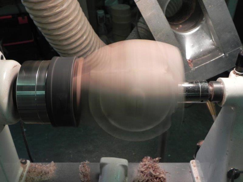 Wood in motion mounted on lathe