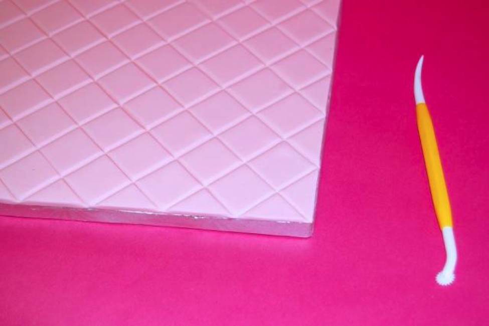 Step 4- Score the fondant across to create uniform squares