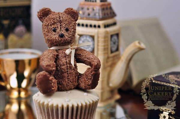 Sweet little teddy bear cupcake topper made out of modeling chocolate