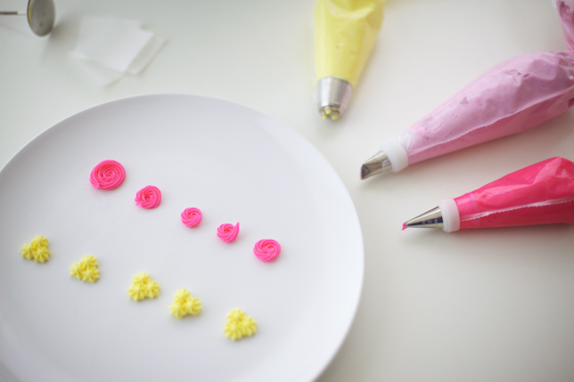 Buttercream pink rosettes and yellow flower buds