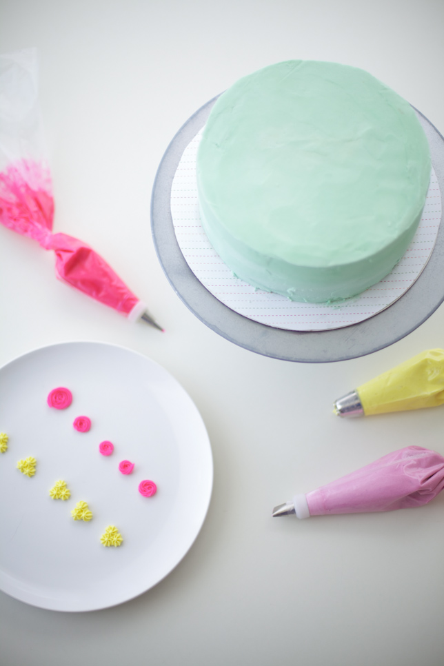 Sea-foam green buttercream frosted cake