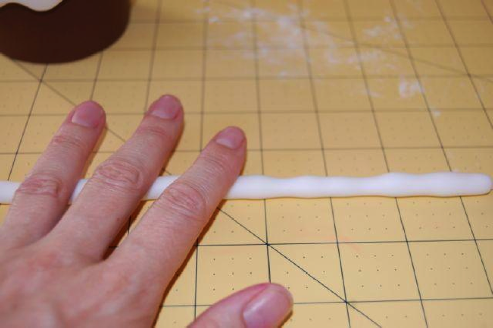 Step 13: Rolling White Fondant Sausage