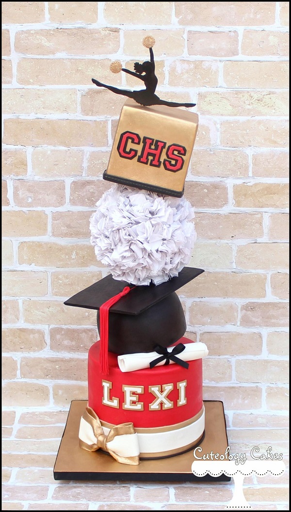 Pom graduation topsy turvy cake