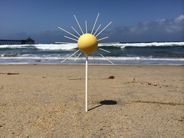 cake pop on beach