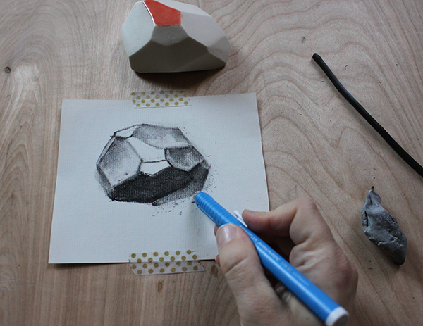 Erasing a charcoal drawing