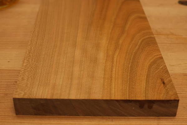 Shellac is applied to the right side of this board
