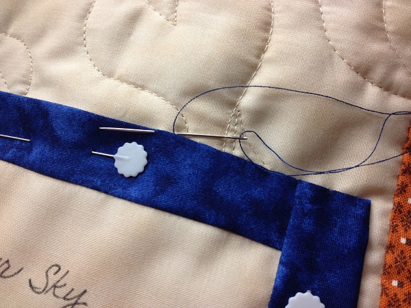 stitching the label on