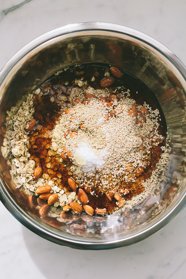 Adding liquid sweetener to granola dry goods