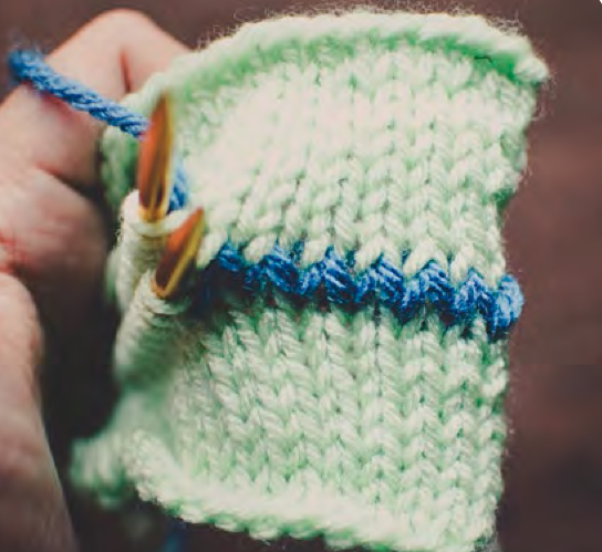 Knitter working on the Kitchener stitch