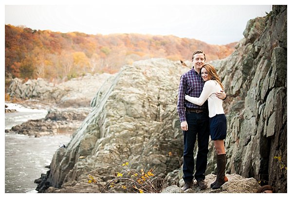 Engaged couple by river