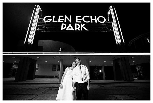 bride and groom at amusement park