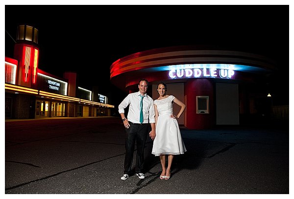 bride and groom at amusement park