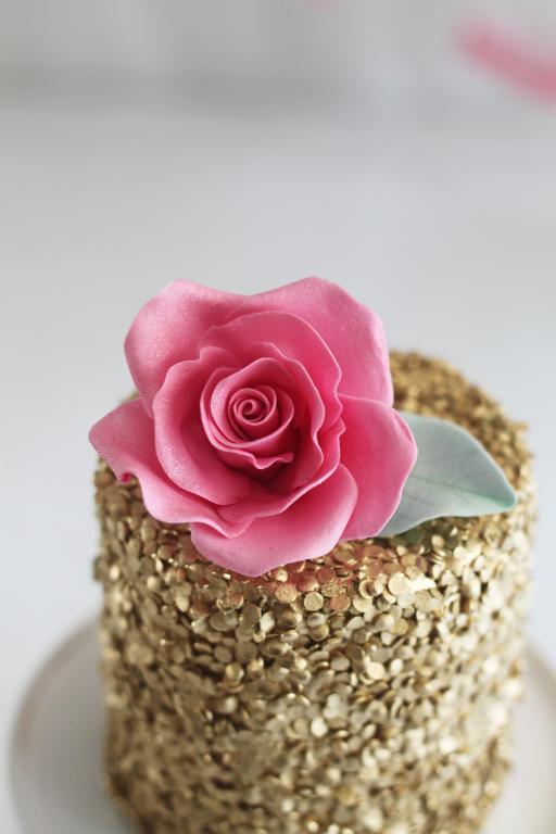 Gold sequins cake with a perfect pink sugar rose