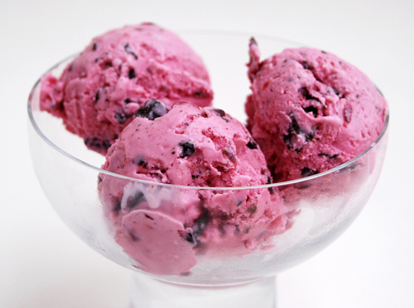 Three Scoops of Pink Ice Cream in a Bowl