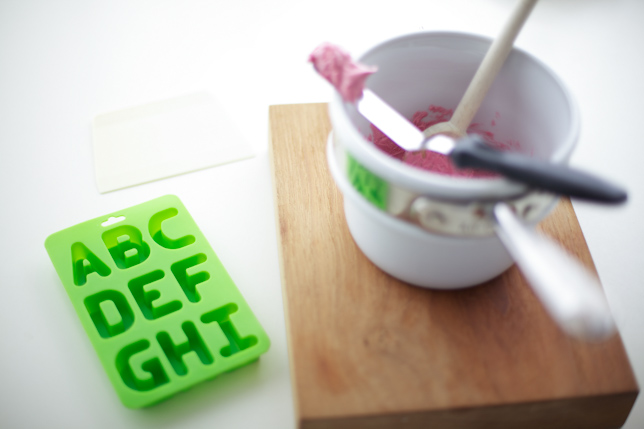green alphabet silicone mold and candy melts