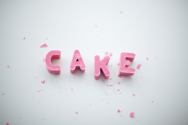 C-A-K-E pink edible letters