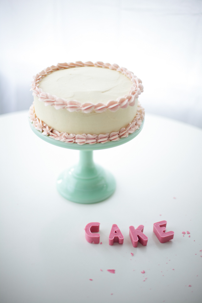 White Frosted and Piped Cake Plus Pink Candy Melt Block Letters