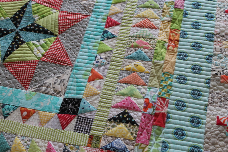 Colorful patchwork quilt with scrap quilt border