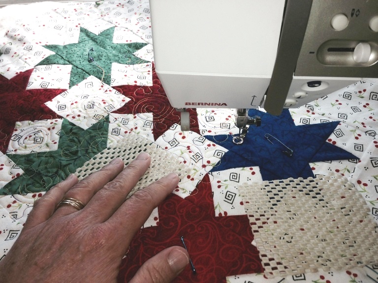 Sticky Squares to Stabilize Quilt