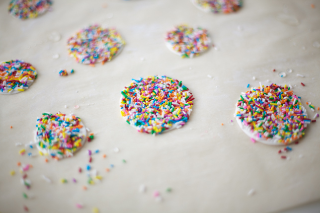 Gum paste dots covered in rainbow sprinkles