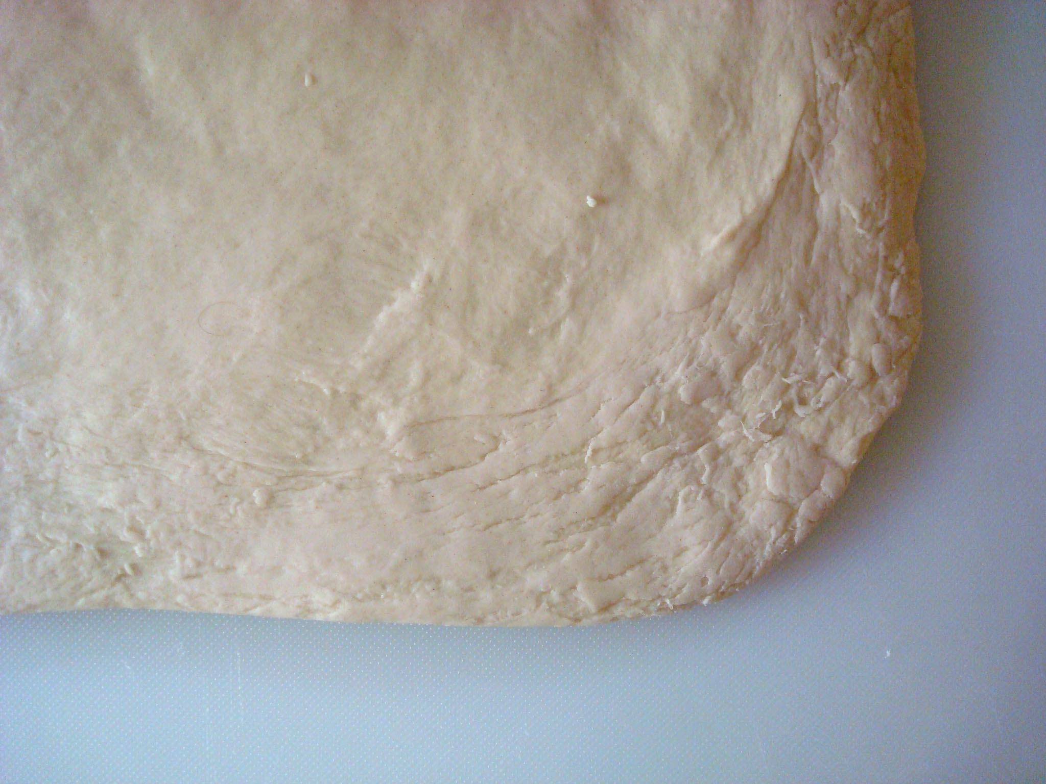 Rolled out sticky bun dough