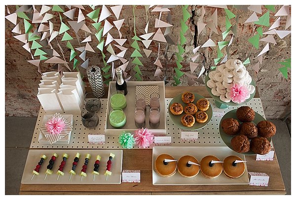 Table with styled food for bridal shower