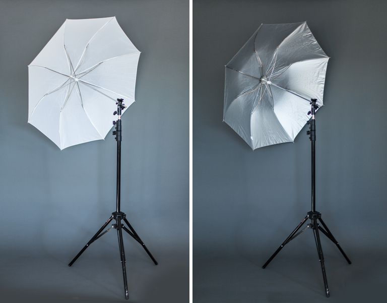 A white umbrella (left) and a silver umbrella