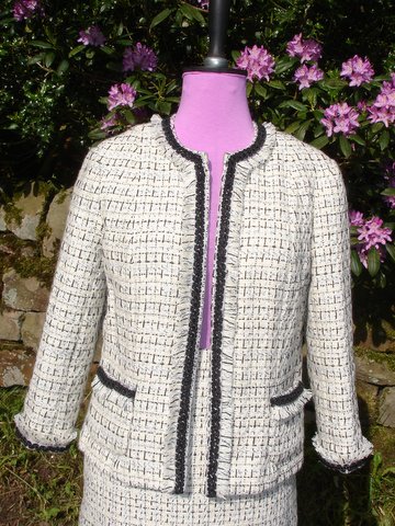 Finished tailored jacket with fringe