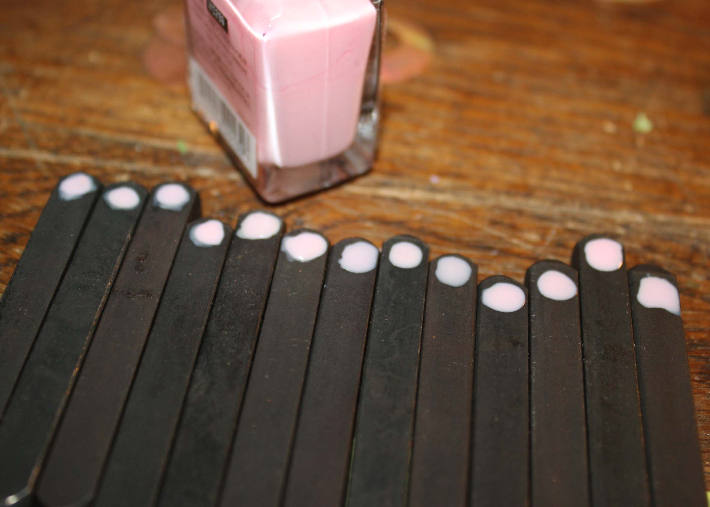 Metal stamps with a dot to label the front of the stamp