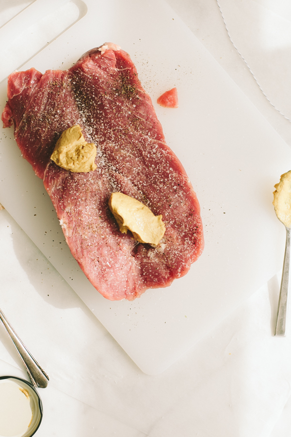 Seasoning a pork loin for the grill