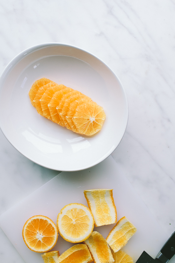 Sliced & plated freshly peeled oranges