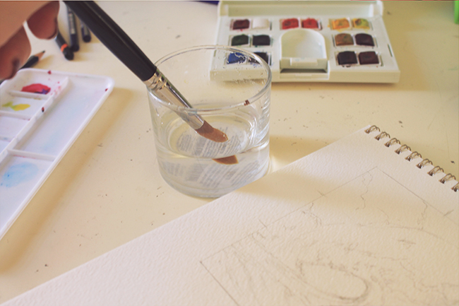 watercolor brush and clean water