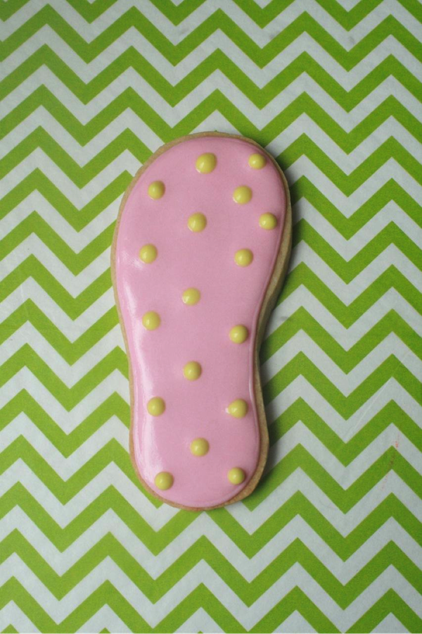 Adding yellow polka dots to the sandal cookie