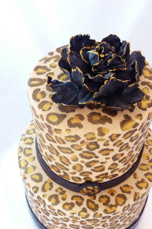 Hand-Painted Cheetah Cake with a Black and Gold Sugar Flower