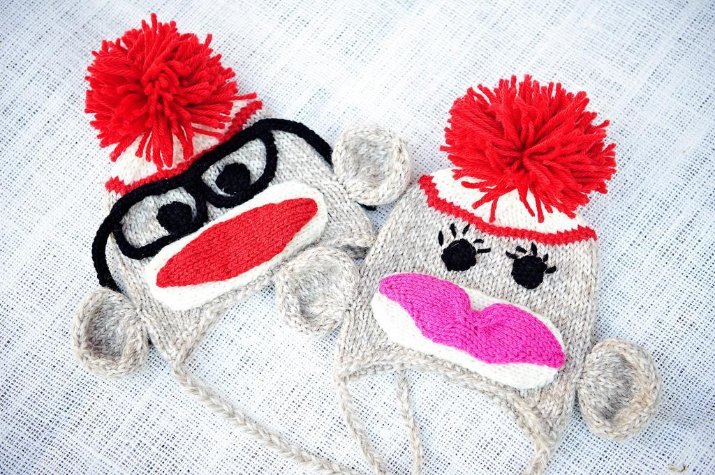 Knitted sock monkey hats