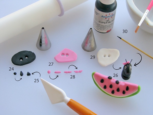 Adding details to watermelon fondant cupcake topper