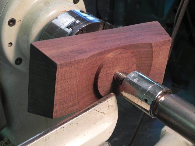 Turning the tenon on the bottom. Blank mounted on  a screw chuck 