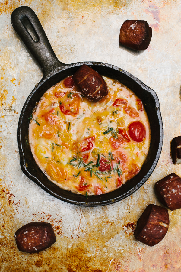 Campfire fondue in a cast-iron skillet