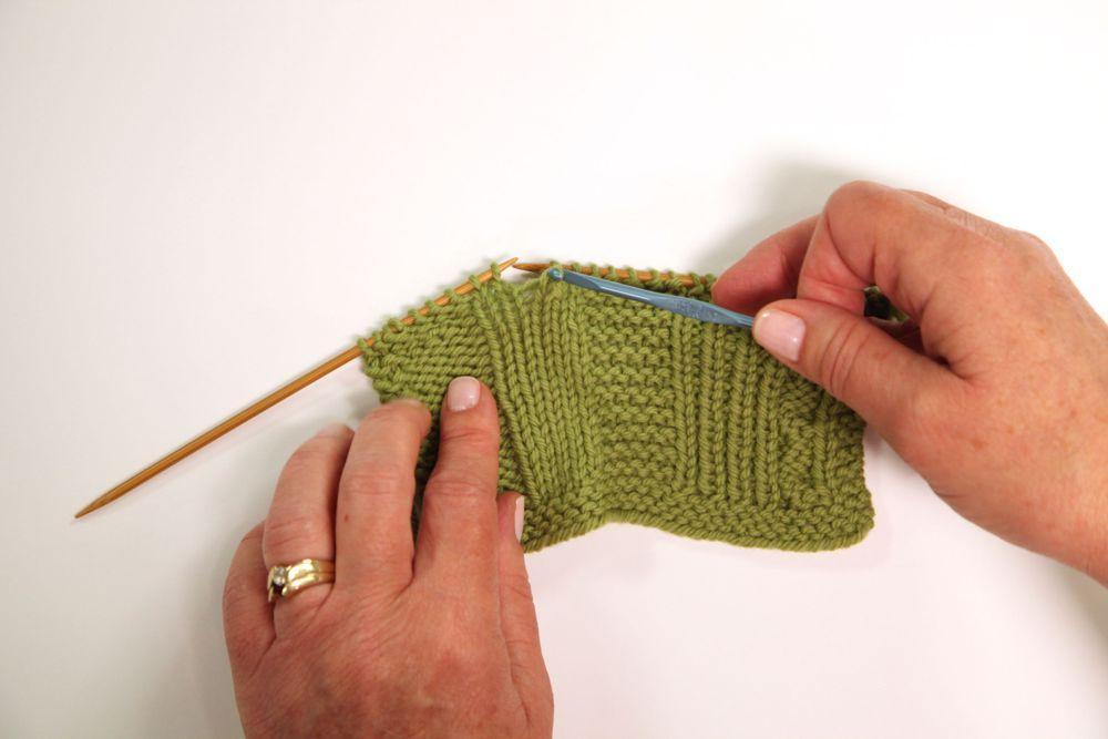 Fixing dropped stitches in knitting