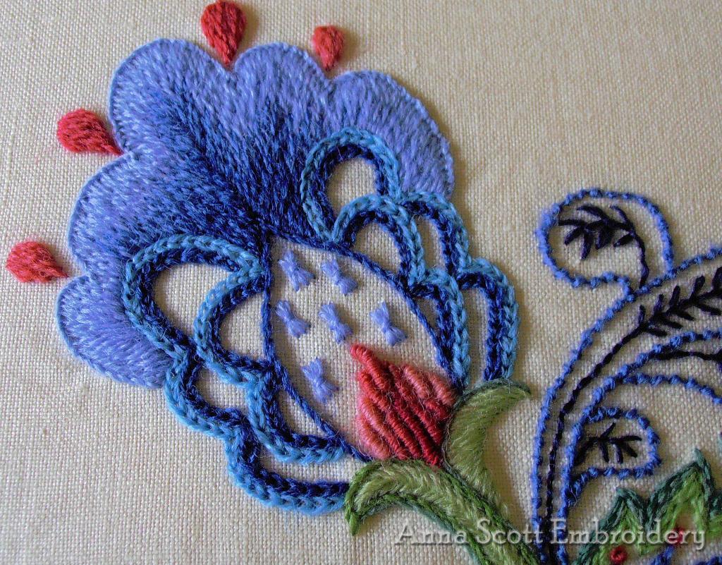 blue and pink floral crewel embroidery