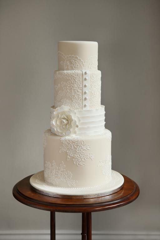 Sleek & Buttoned-up White Wedding Cake