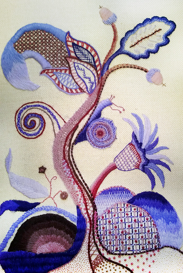 Crewel work tradition: Tree of Life pattern in purple and reds