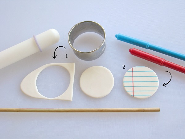 Make a cute notebook paper cutout for your back to school cupcakes