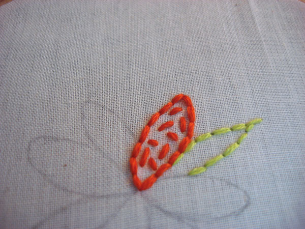 Seed stitches are shown in a petal.