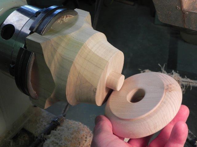 A tenon used to mount pieces drilled for a candlestick.
